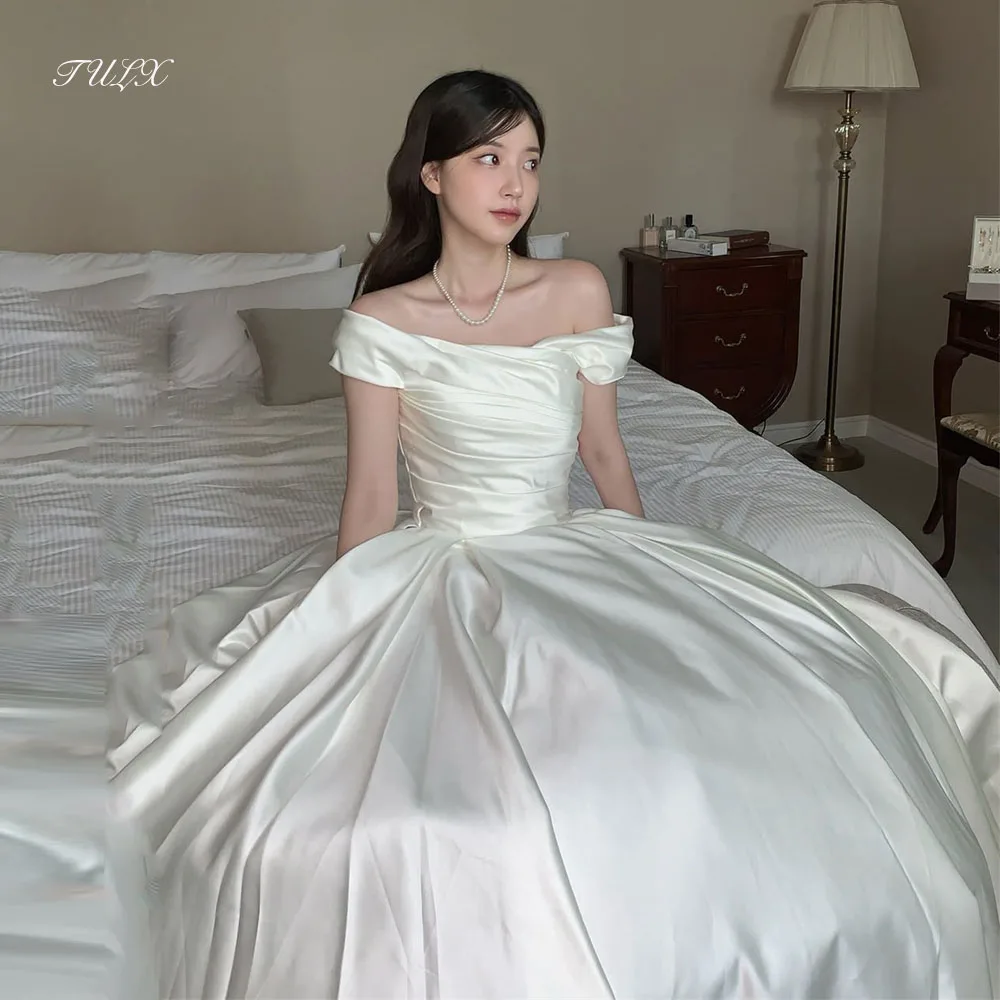 TULX Elegant Ivory Satin Wedding Dress Korea Photo Shoot Off Shoulder A line Long Bridal Gowns Corset Customized 웨딩드레스 2026
TULX Elegant Ivory Satin Wedding Dress Korea Photo Shoot Off Shoulder A line Long Bridal Gowns Corset Customized 웨딩드레스 2026