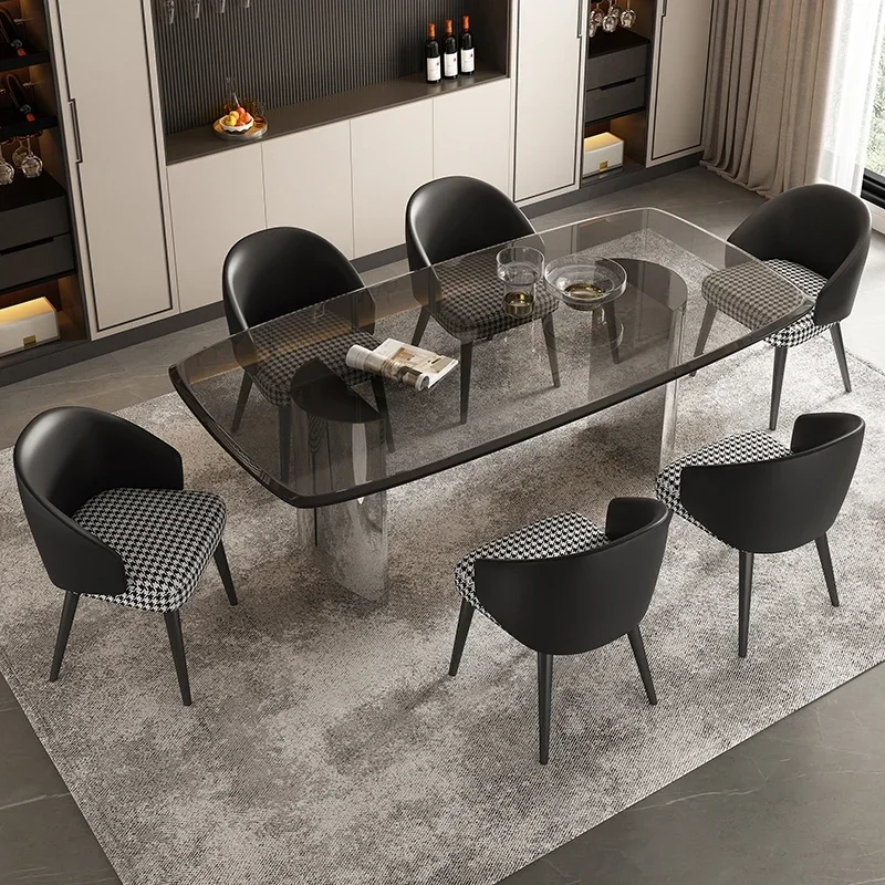 Minimalist dining table and chair combination Modern household rectangular tempered glass light luxury dining table combination
Minimalist dining table and chair combination Modern household rectangular tempered glass light luxury dining table combination