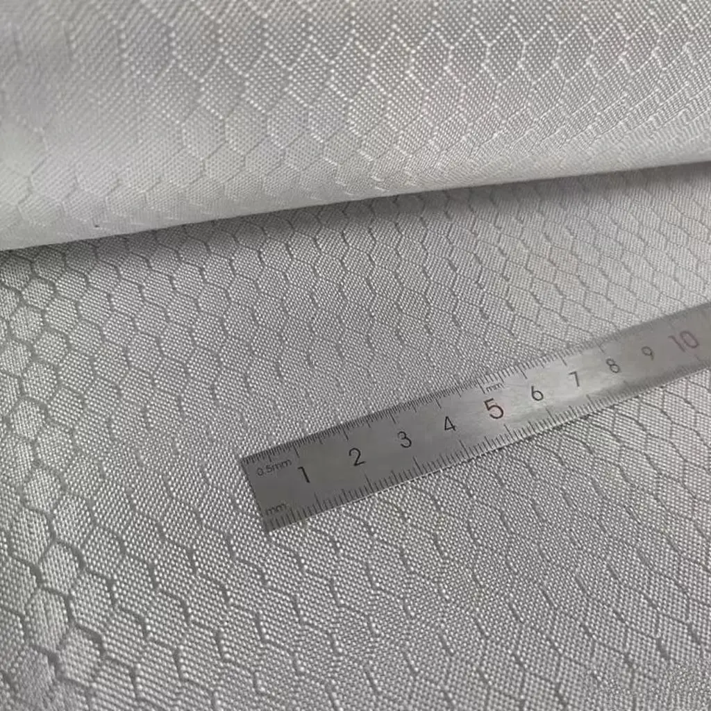 240gsm 2x2 Football honeycomb pattern fabric Glass carbon blend plating Silver fabric, 40" inch / 100cm width 1m lengh.
240gsm 2x2 Football honeycomb pattern fabric Glass carbon blend plating Silver fabric, 40" inch / 100cm width 1m lengh.