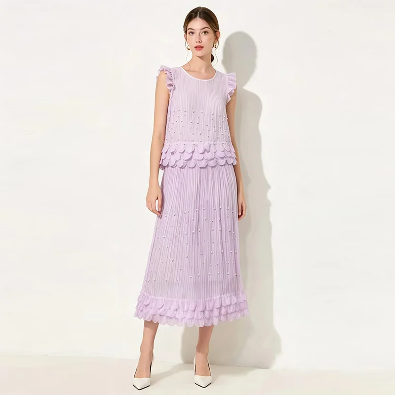 Women Sleeveless Pleated Midi Dress Pearl Beading Ruffle Tiered Skirt Elegant Wedding Guest Party 2026 Summer New Fashion
Women Sleeveless Pleated Midi Dress Pearl Beading Ruffle Tiered Skirt Elegant Wedding Guest Party 2026 Summer New Fashion