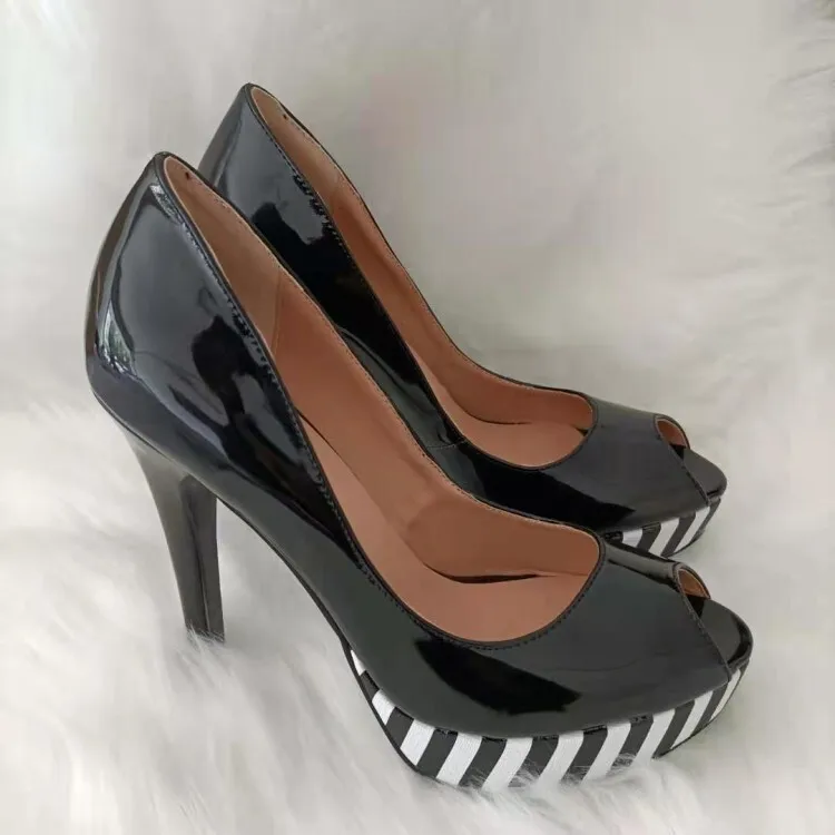 Женские черные лакированные туфли-лодочки с открытым носком на шпильке, с платформой в полоску под зебру, в смелом ретро-стиле для вечеринок, ночных клубов, модный образ
Женские черные лакированные туфли-лодочки с открытым носком на шпильке, с платформой в полоску под зебру, в смелом ретро-стиле для вечеринок, ночных клубов, модный образ