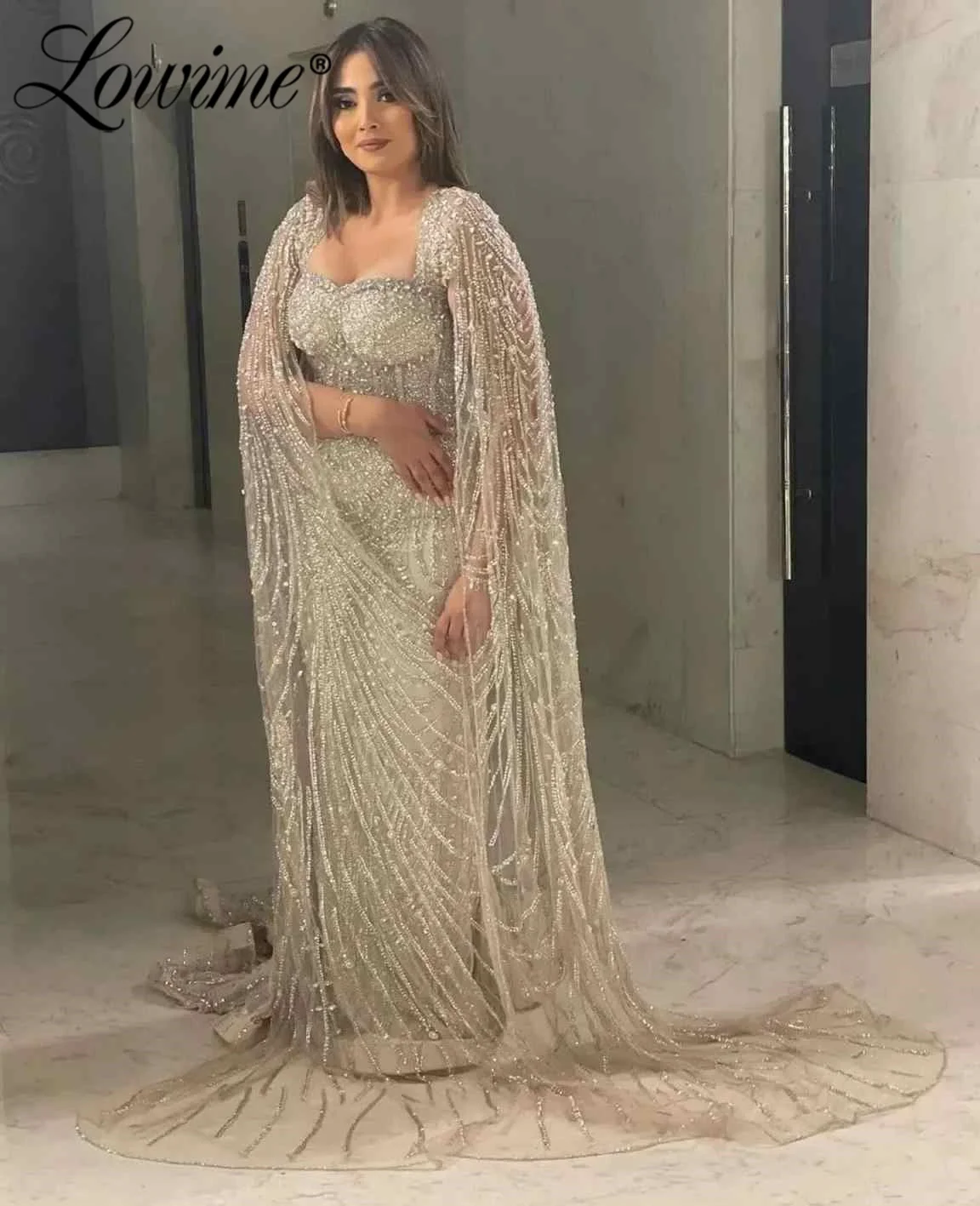 Изысканное вечернее платье с тяжелыми бусинами в арабском стиле, с рукавами-накидкой на заказ, для торжественных мероприятий, с кисточками, жемчугом и кристаллами, женское платье для выпускного вечера
Изысканное вечернее платье с тяжелыми бусинами в арабском стиле, с рукавами-накидкой на заказ, для торжественных мероприятий, с кисточками, жемчугом и кристаллами, женское платье для выпускного вечера