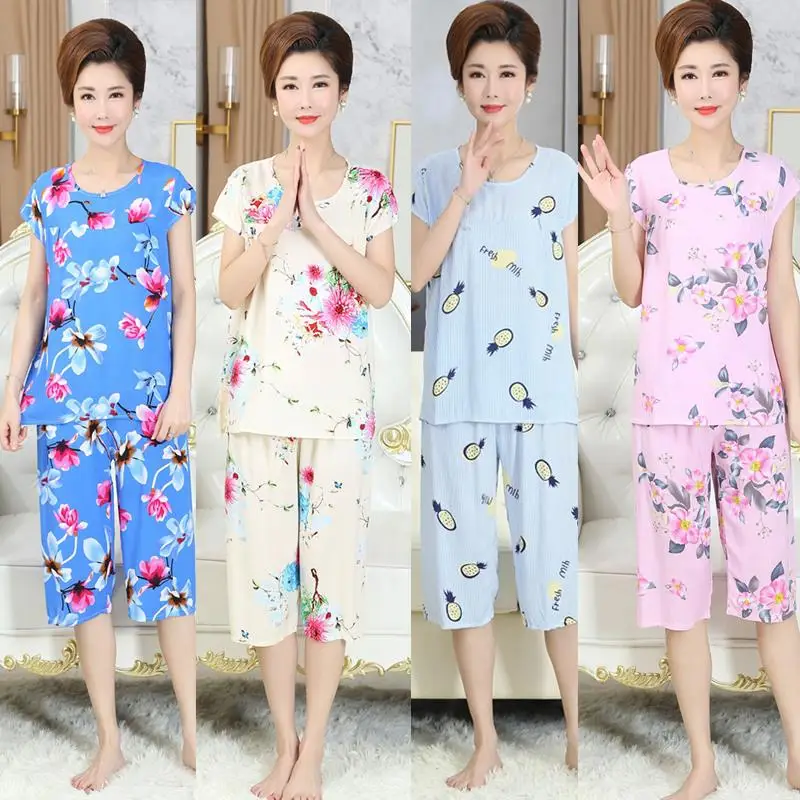 Spring Summer Autumn Ladies Cotton Silk Short Sleeve Sleepwear Thin Seven-Foot Pants Home Clothes Set plus Size Comfortable
Spring Summer Autumn Ladies Cotton Silk Short Sleeve Sleepwear Thin Seven-Foot Pants Home Clothes Set plus Size Comfortable