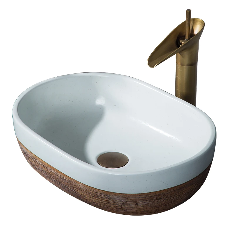Креативная керамическая настольная художественная раковина в стиле ваби-саби, овальная раковина для ванной комнаты, балкона
Креативная керамическая настольная художественная раковина в стиле ваби-саби, овальная раковина для ванной комнаты, балкона
