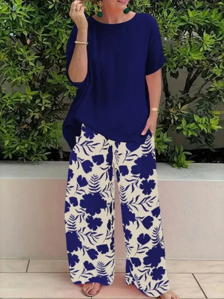 Summer African Clothes for Women Fashion Short Sleeve Polyester 2 Piece Top Long Pant Matching Sets Dashiki African Clothing
Summer African Clothes for Women Fashion Short Sleeve Polyester 2 Piece Top Long Pant Matching Sets Dashiki African Clothing