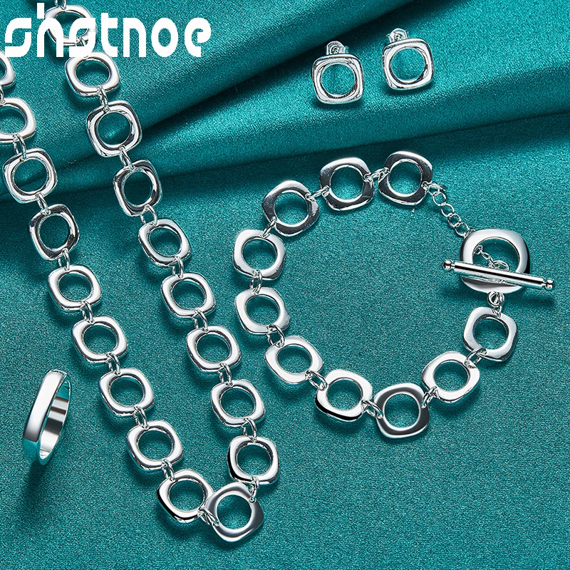 4pcs 925 Sterling Silver Woman Square Hollow Circle Earrings Ring Chain Necklace Bracelet Jewelry Sets Lady Wedding Party Gifts
4pcs 925 Sterling Silver Woman Square Hollow Circle Earrings Ring Chain Necklace Bracelet Jewelry Sets Lady Wedding Party Gifts