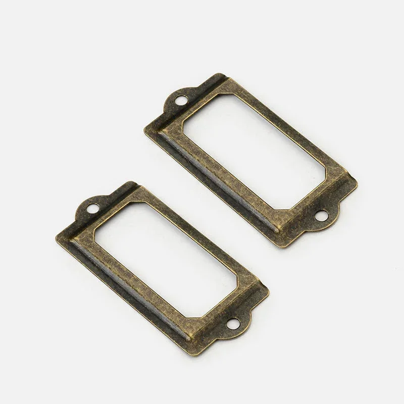 12Pcs Metal Label Pull Frame Antique Brass Brass Label Holders Portable Multi-function Durable Convenient for Furniture Cabinet
12Pcs Metal Label Pull Frame Antique Brass Brass Label Holders Portable Multi-function Durable Convenient for Furniture Cabinet