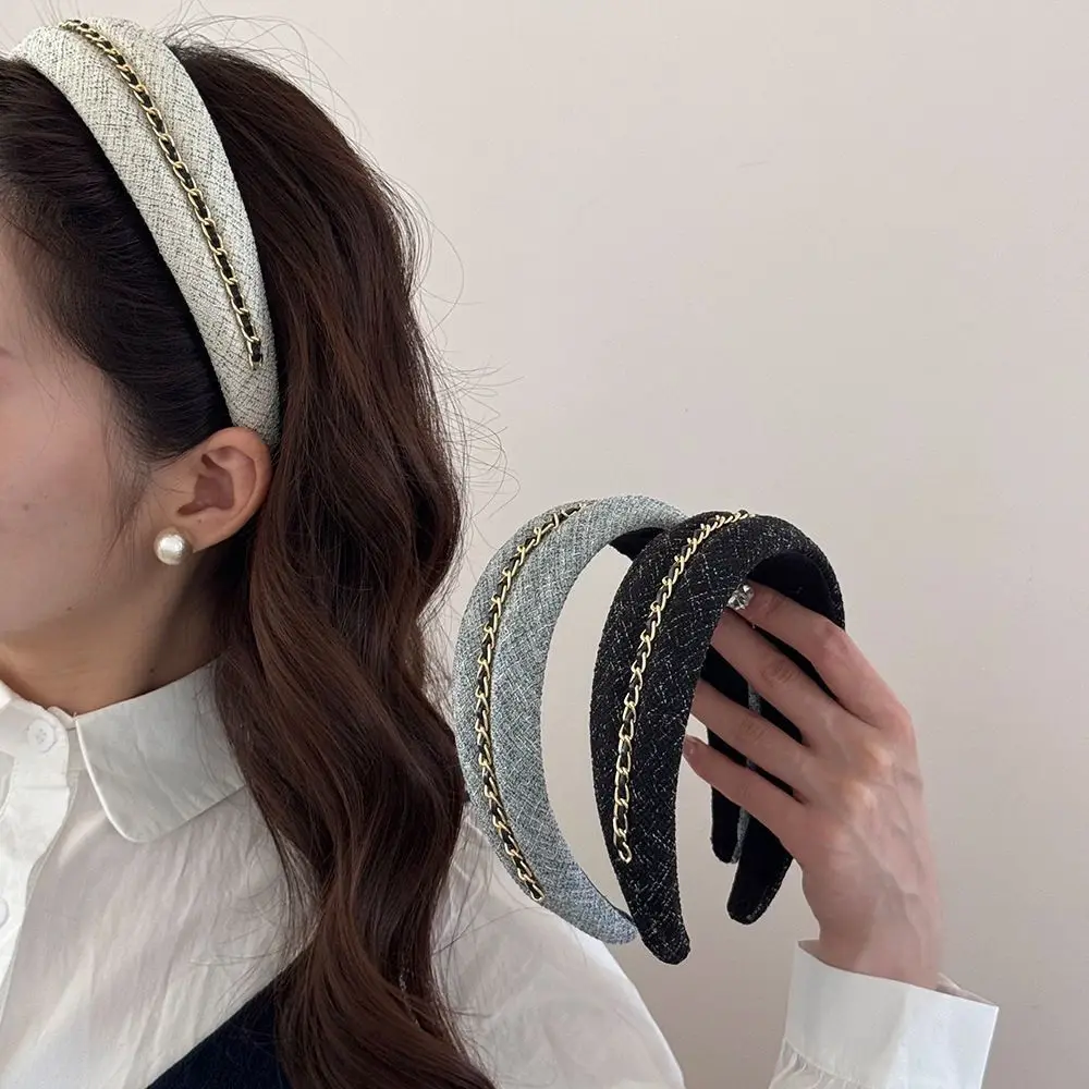 Черная шерстяная повязка на голову с цепочкой, широкими полями и высокой тульей, подчеркивающая овал лица, элегантная заколка и украшение для волос
Черная шерстяная повязка на голову с цепочкой, широкими полями и высокой тульей, подчеркивающая овал лица, элегантная заколка и украшение для волос