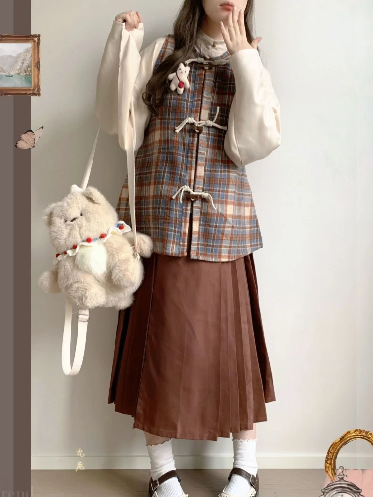 Fashion Vintage Three-piece Suit Stand Neck Long Sleeve Blouses+plaid Horn Button Vests+pleated Long Skirts Women Clothing 2025
Fashion Vintage Three-piece Suit Stand Neck Long Sleeve Blouses+plaid Horn Button Vests+pleated Long Skirts Women Clothing 2025