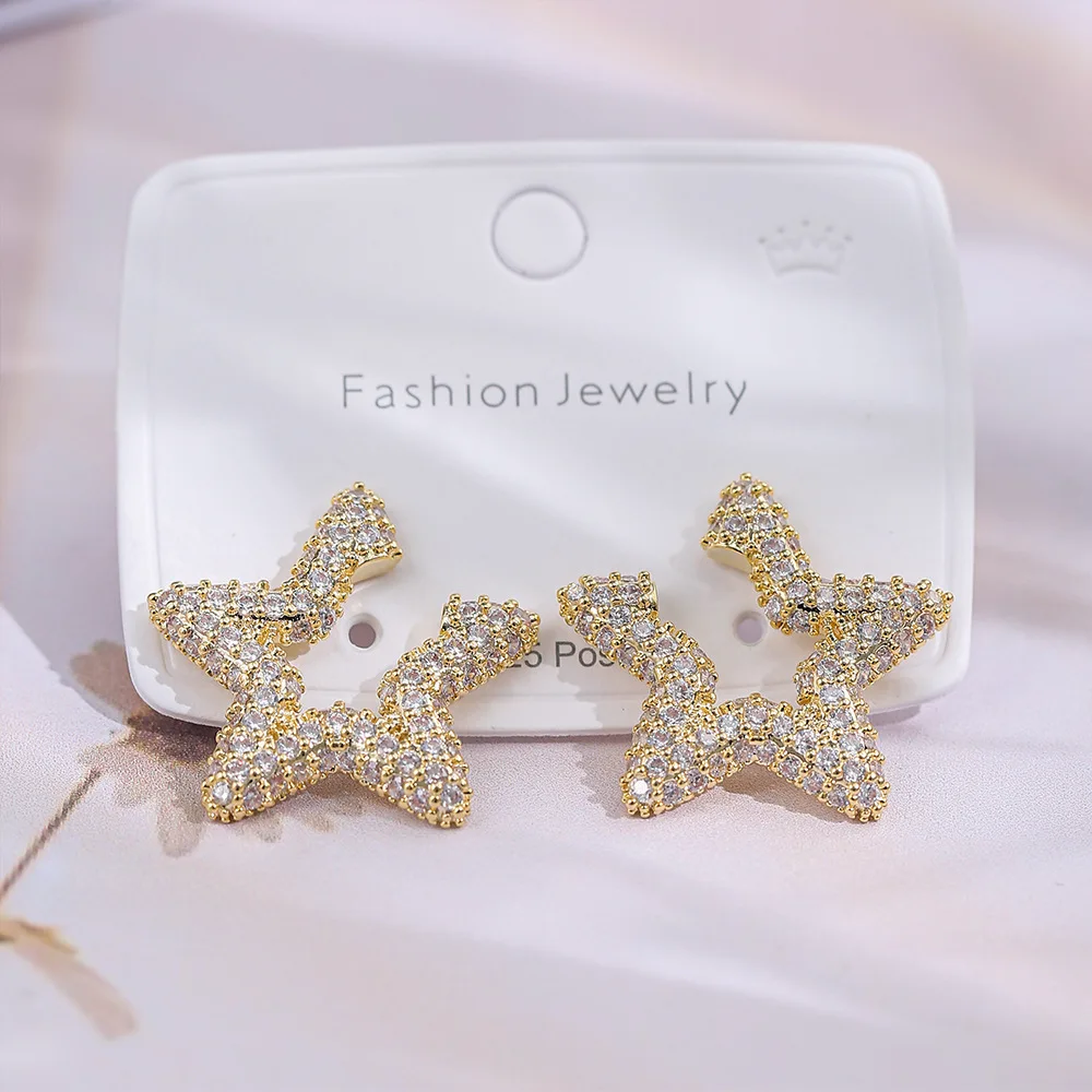 Starry sparkling full diamond five-star earrings silver needle fashion niche light luxury high-end earrings women's earrings
Starry sparkling full diamond five-star earrings silver needle fashion niche light luxury high-end earrings women's earrings