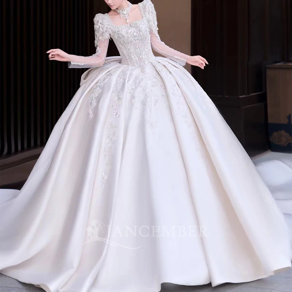 Customized Ball Gown Wedding Dress Exquisite Square Collar Beaded Long Sleeves Bridal Gown Bride Dresses فساتين حفلات
Customized Ball Gown Wedding Dress Exquisite Square Collar Beaded Long Sleeves Bridal Gown Bride Dresses فساتين حفلات