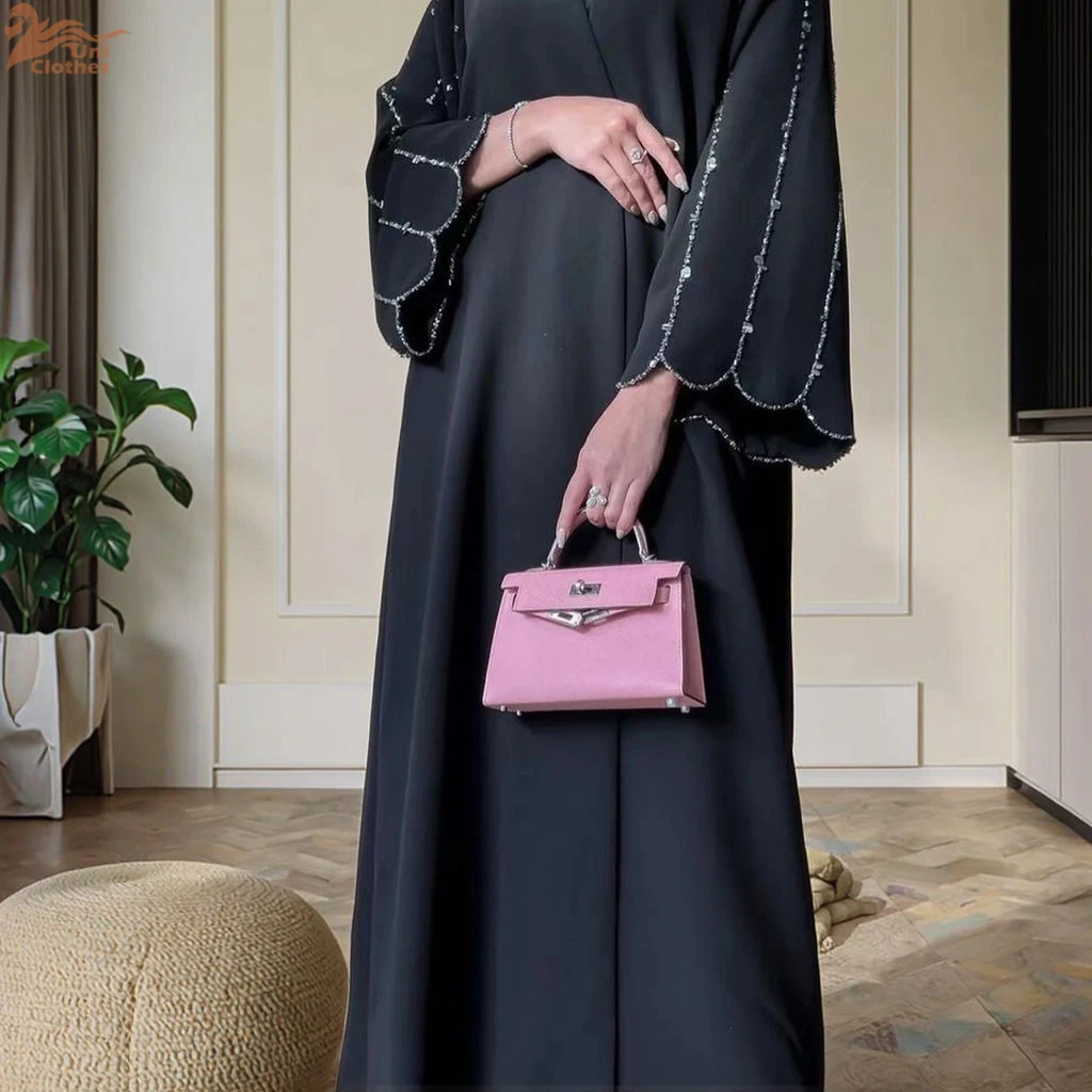 Уни исламская одежда Дубай Роскошная Абая женское мусульманское платье с бриллиантами и бисером черный кардиган Абая спереди с открытой Абая
Уни исламская одежда Дубай Роскошная Абая женское мусульманское платье с бриллиантами и бисером черный кардиган Абая спереди с открытой Абая