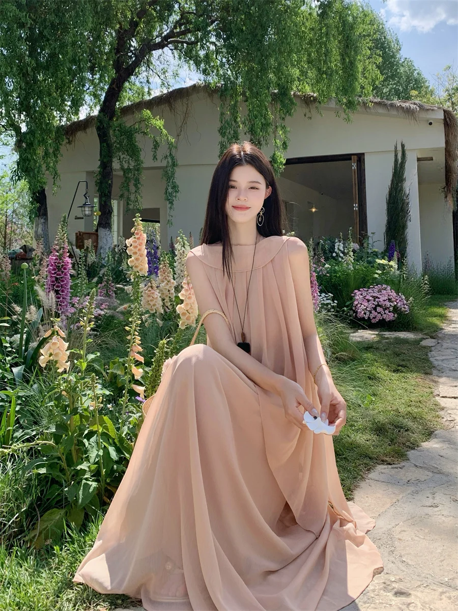 Summer Women's Chiffon Shirt And Skirt Set with Irregular Hemline And Hanging Neck Design Sleeveless And Flowy in Pink
Summer Women's Chiffon Shirt And Skirt Set with Irregular Hemline And Hanging Neck Design Sleeveless And Flowy in Pink