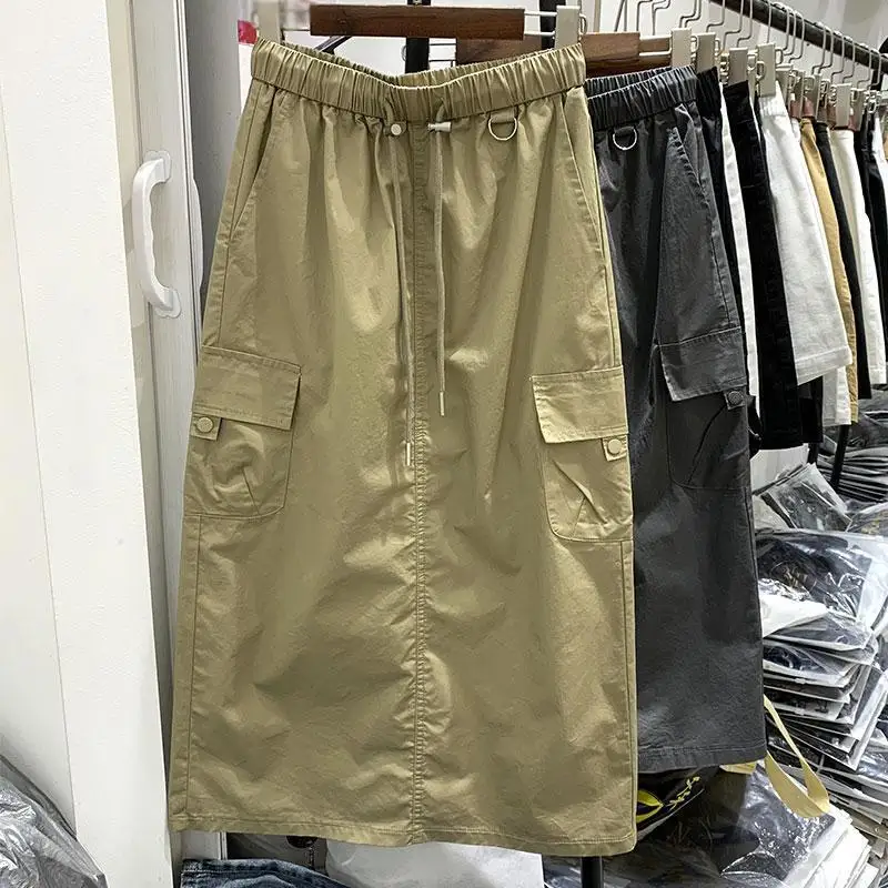 Retro Elastic High Waist Tooling Skirt Women's Casual Loose Flap Pocket Drawstring Midi Cargo Skirts
Retro Elastic High Waist Tooling Skirt Women's Casual Loose Flap Pocket Drawstring Midi Cargo Skirts