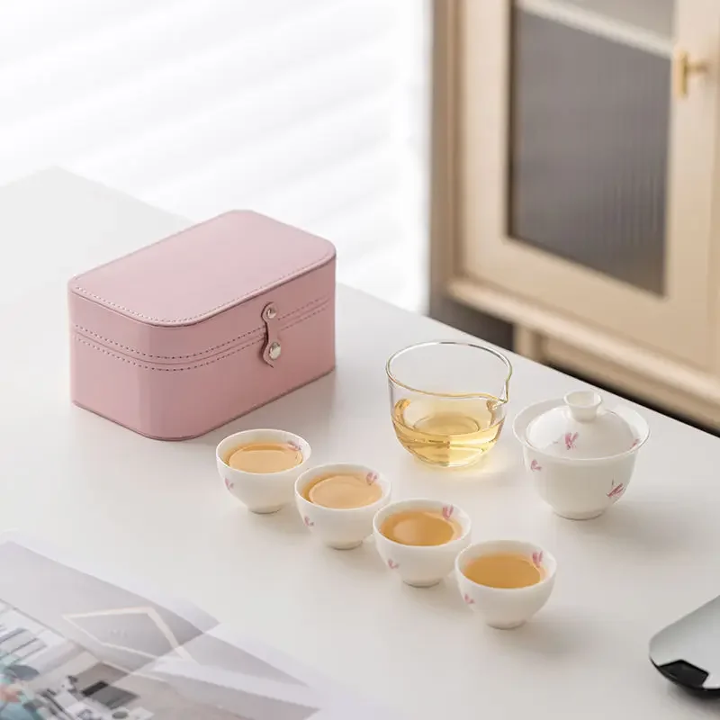 Lamb fat jade porcelain portable travel tea set small one pot two cups of ceramic covered bowl tea cup outdoor camping tea
Lamb fat jade porcelain portable travel tea set small one pot two cups of ceramic covered bowl tea cup outdoor camping tea