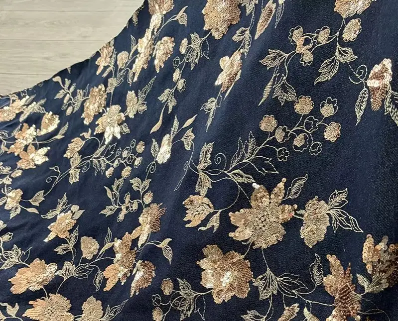 High-end gold sequin embroidered 100% cotton denim fabric, used for clothing, vests, skirts, bags, DIY sewing fabric
High-end gold sequin embroidered 100% cotton denim fabric, used for clothing, vests, skirts, bags, DIY sewing fabric