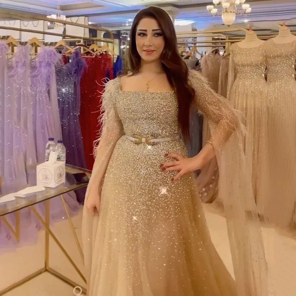 Hot Sale Arabic Gold A Line Feathers Cape Sleeves Beaded Luxury Evening Dresses Gowns For Women Party 2023 LA71782 Best Price
Hot Sale Arabic Gold A Line Feathers Cape Sleeves Beaded Luxury Evening Dresses Gowns For Women Party 2023 LA71782 Best Price