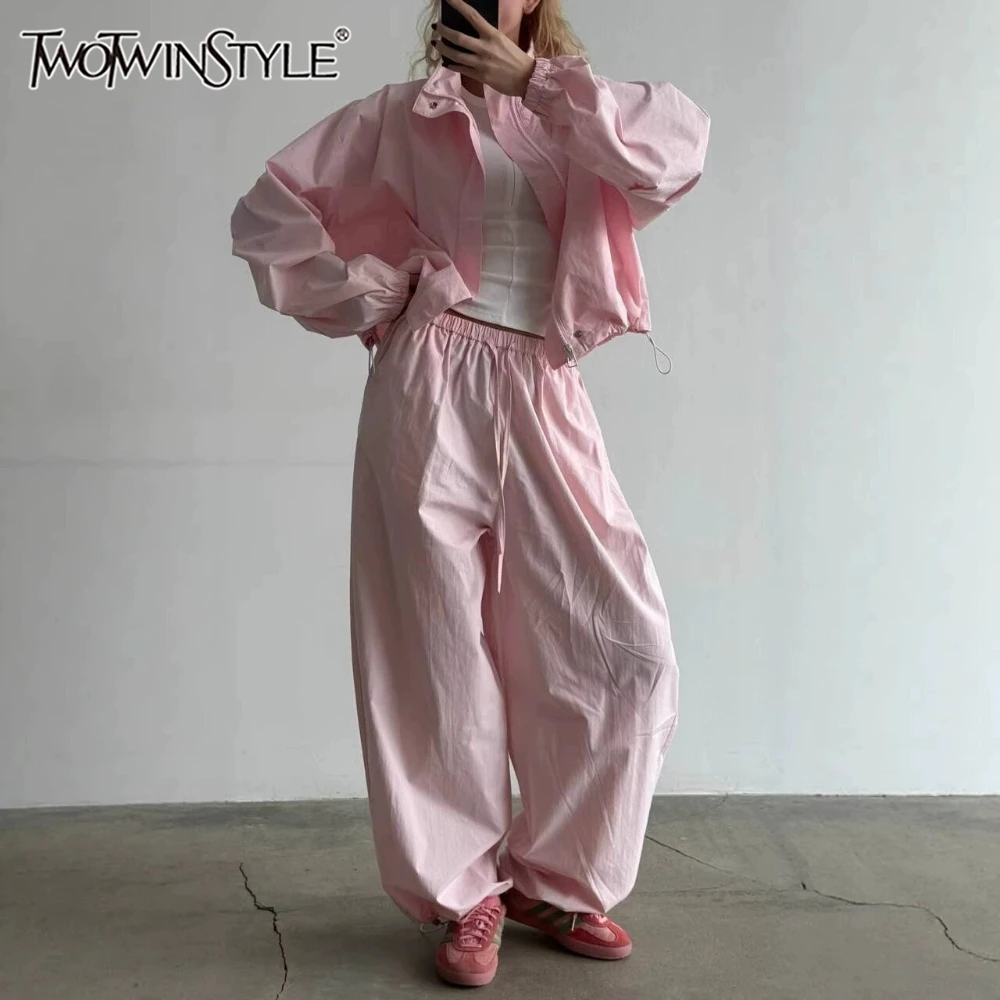 TWOTWINSTYLE Solid Spliced Drawstring Two Piece Set Female Stand Collar Long Sleeve Top Casual French Women's Pants Sets Fashion
TWOTWINSTYLE Solid Spliced Drawstring Two Piece Set Female Stand Collar Long Sleeve Top Casual French Women's Pants Sets Fashion