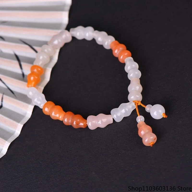 Изысканный золотой шелковый нефритовый персиковый браслет, новый мужской и женский браслет с тыквой в китайском темпераменте
Изысканный золотой шелковый нефритовый персиковый браслет, новый мужской и женский браслет с тыквой в китайском темпераменте