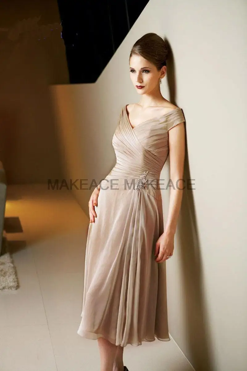Mother of the Bride Dresses Elegant Knee Length Evening Gowns Formal Backless Pleated Applique Prom Party robe soirée femme
Mother of the Bride Dresses Elegant Knee Length Evening Gowns Formal Backless Pleated Applique Prom Party robe soirée femme