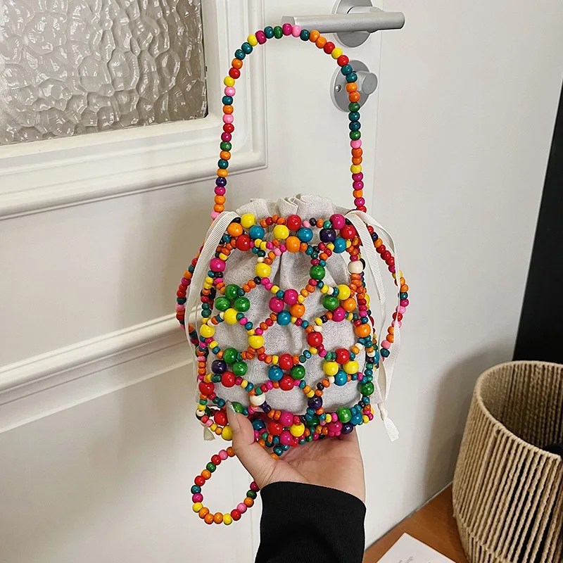 Fashion Luxury Pearl Beaded Bag Hollow Out Bohemia Woven Bead underarm Bag with Inner Bag Handmade Small Phone Pouch Shopping
Fashion Luxury Pearl Beaded Bag Hollow Out Bohemia Woven Bead underarm Bag with Inner Bag Handmade Small Phone Pouch Shopping