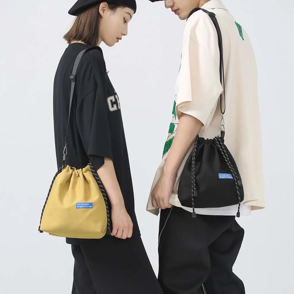 Nylon Drawstring Bucket Bag Casual Storage Korean Style Shoulder Bag All-match Black/White/Yellow Men Crossbody Bag Female/Male
Nylon Drawstring Bucket Bag Casual Storage Korean Style Shoulder Bag All-match Black/White/Yellow Men Crossbody Bag Female/Male