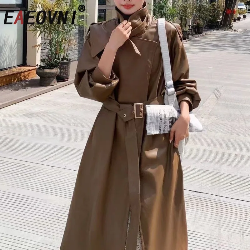 EAEOVNI Fashion Leather Long Trench Coat Women Autumn Winter New Solid Color Belt Gathered Waist Windbreaker 2025 Clothing
EAEOVNI Fashion Leather Long Trench Coat Women Autumn Winter New Solid Color Belt Gathered Waist Windbreaker 2025 Clothing