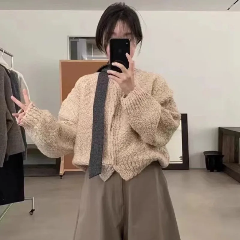 Lazy Style Thick Long Sleeved Knitted Cardigan Top for Women 2024 Winter New Fashion Versatile Sweater Jacket
Lazy Style Thick Long Sleeved Knitted Cardigan Top for Women 2024 Winter New Fashion Versatile Sweater Jacket