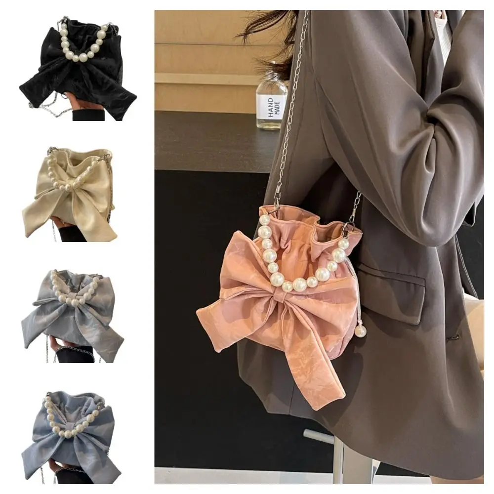 Portable Elegant Drawstring Bucket Bag Pearl Chain Sweet Big Bowknot Shoulder Bag Handbag Solid Color Crossbody Bag Ladies
Portable Elegant Drawstring Bucket Bag Pearl Chain Sweet Big Bowknot Shoulder Bag Handbag Solid Color Crossbody Bag Ladies