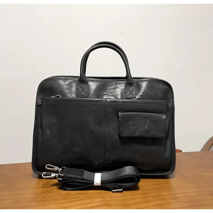 Vegetable tanned first layer cowhide handbag business leather computer briefcase
Vegetable tanned first layer cowhide handbag business leather computer briefcase