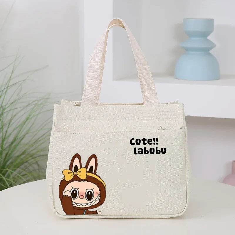 New Women's handbag Fashion Canvas Bags LABUBU Cartoon Print Handbag Cartoon Portable Tote Bag Lunch Box Bag
New Women's handbag Fashion Canvas Bags LABUBU Cartoon Print Handbag Cartoon Portable Tote Bag Lunch Box Bag