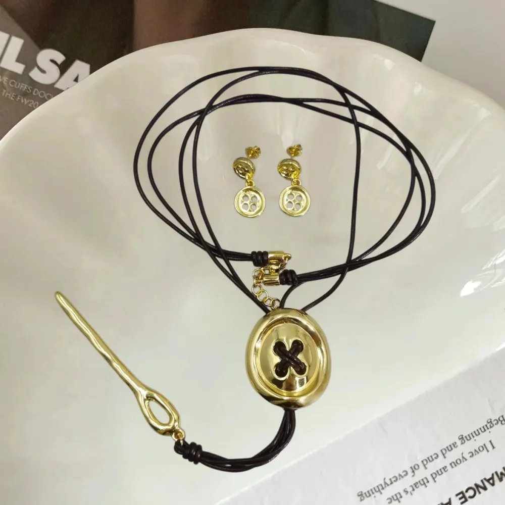 2026 Spring Leisure Vacation Style Gold Silver Button Earrings Leather Rope Necklace Jewelry Two Piece Set Holiday Gift
2026 Spring Leisure Vacation Style Gold Silver Button Earrings Leather Rope Necklace Jewelry Two Piece Set Holiday Gift