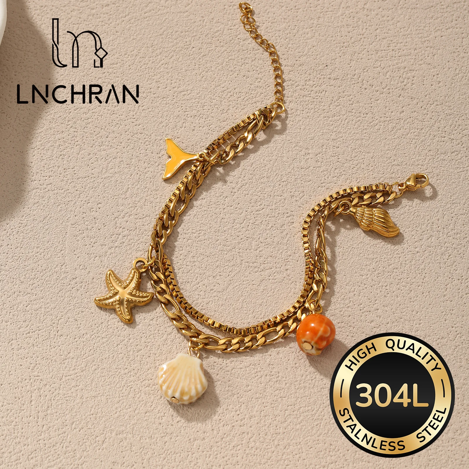 Golden Tone Stainless Steel Ocean Charm Bracelet with Shell Starfish and Octopus Pendants for Women
Golden Tone Stainless Steel Ocean Charm Bracelet with Shell Starfish and Octopus Pendants for Women