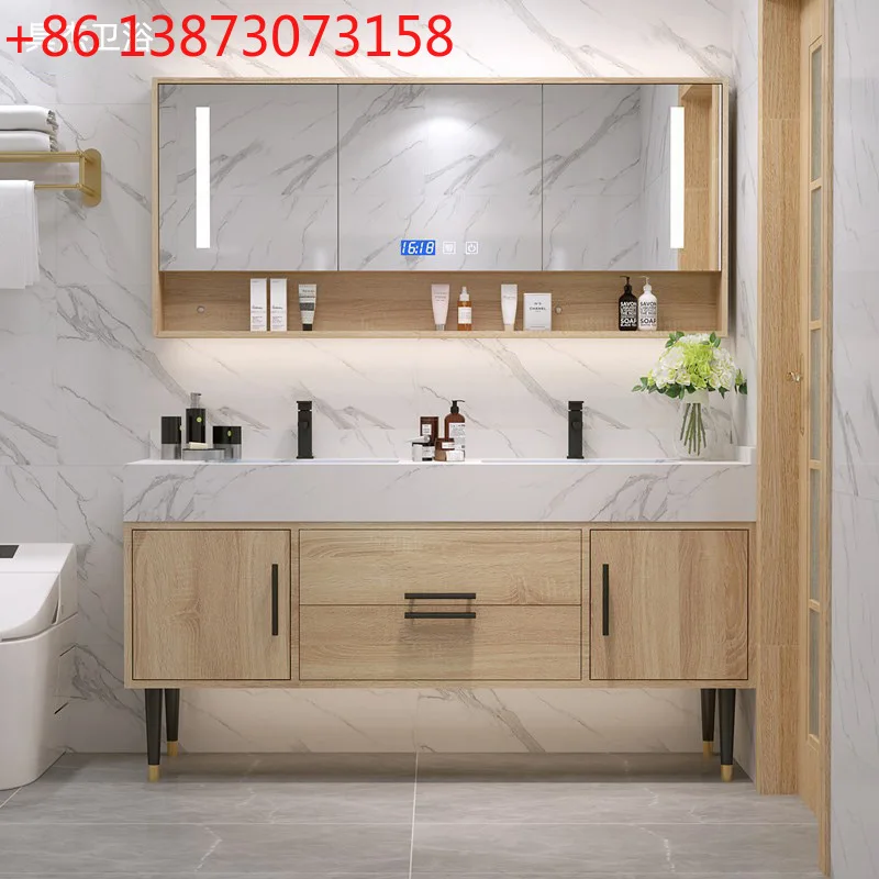Комплект мебели для ванной комнаты для малогабаритных квартир: умный шкафчик с интегрированной раковиной из каменной плиты и столешницей для умывания.
Комплект мебели для ванной комнаты для малогабаритных квартир: умный шкафчик с интегрированной раковиной из каменной плиты и столешницей для умывания.