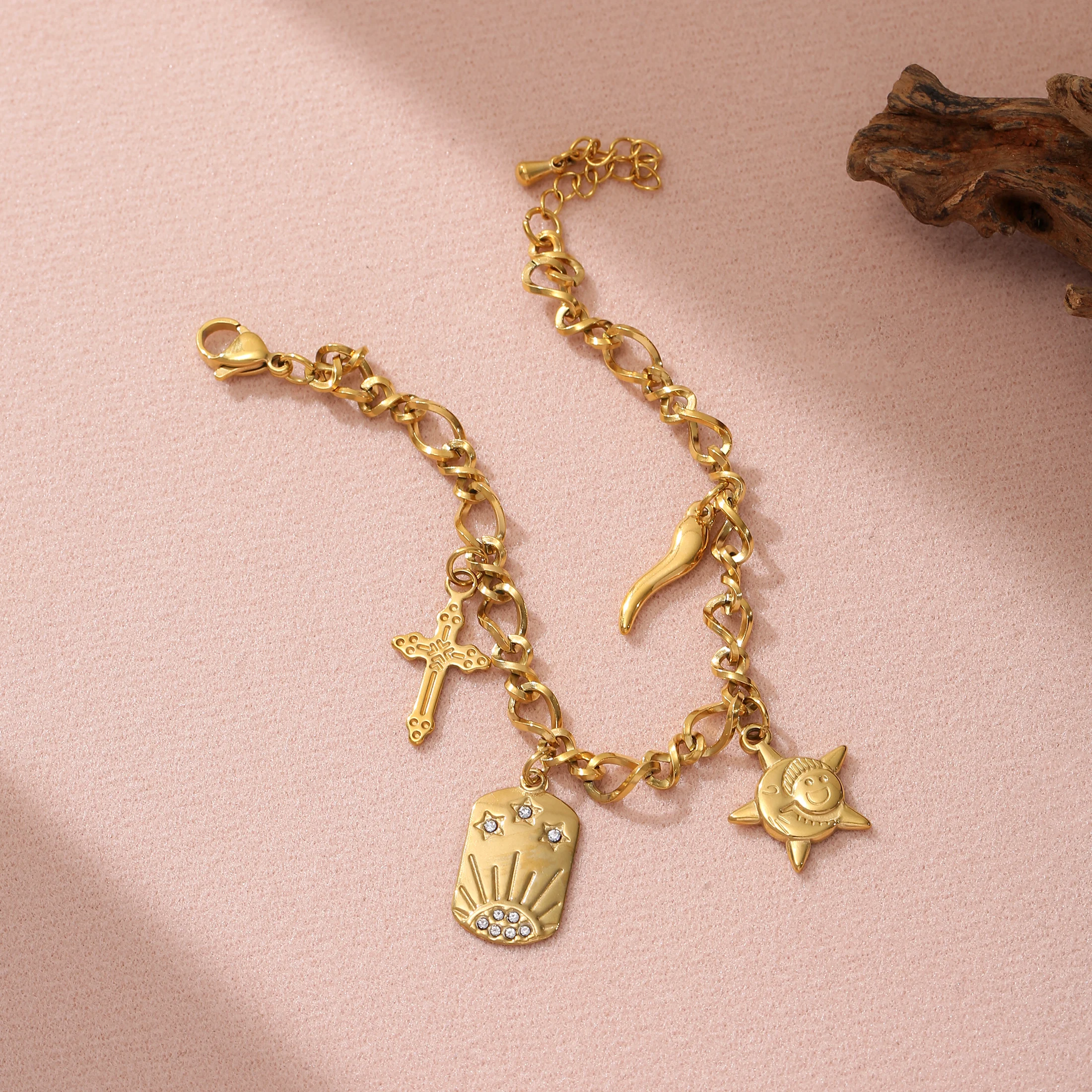 Golden Tone Stainless Steel Multi-Charm Bracelet with Cross and Sun Pendants for Women
Golden Tone Stainless Steel Multi-Charm Bracelet with Cross and Sun Pendants for Women