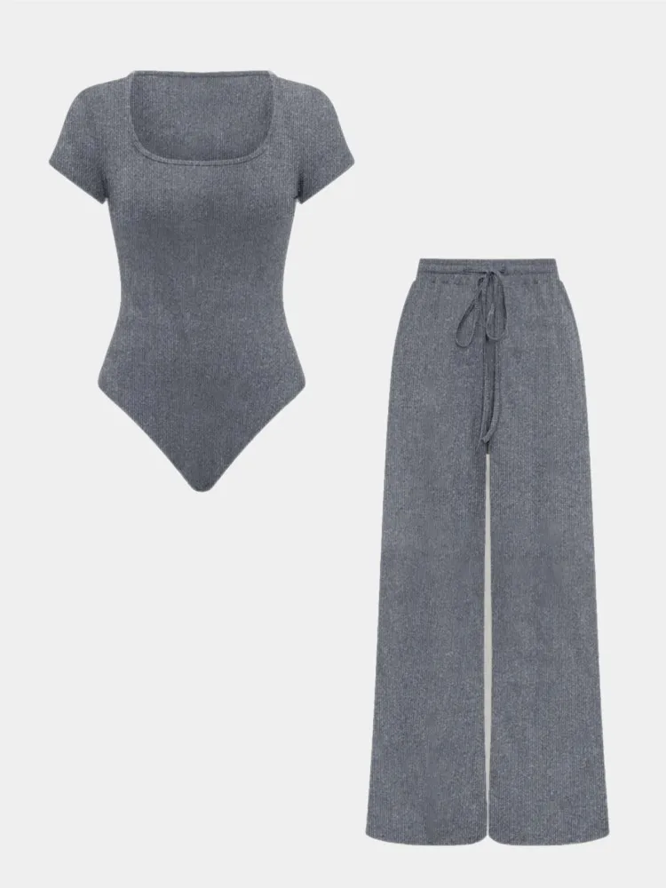 2026 Spring Summer New Comfortable Casual Women's Suit Fashionable Solid Color Slim Fit Jumpsuit & Loose Trousers Two-piece Set
2026 Spring Summer New Comfortable Casual Women's Suit Fashionable Solid Color Slim Fit Jumpsuit & Loose Trousers Two-piece Set