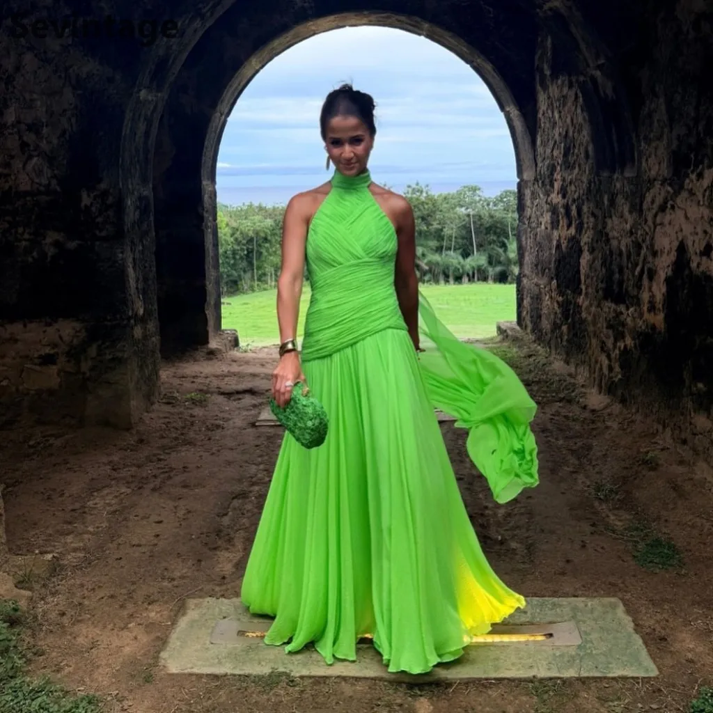 Sevintage 2025 Lime Green Chiffon Halter Neck Ruched Maxi Evening Gown with Flowing Cape Train Customized
Sevintage 2025 Lime Green Chiffon Halter Neck Ruched Maxi Evening Gown with Flowing Cape Train Customized
