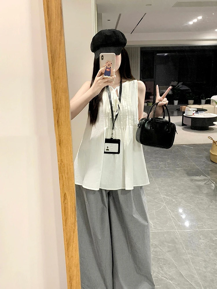White Sleeveless Shoulder Bared round Neck Loose Fit Women's Vest Design Sensation Slimming Summer Top for Small Stature
White Sleeveless Shoulder Bared round Neck Loose Fit Women's Vest Design Sensation Slimming Summer Top for Small Stature