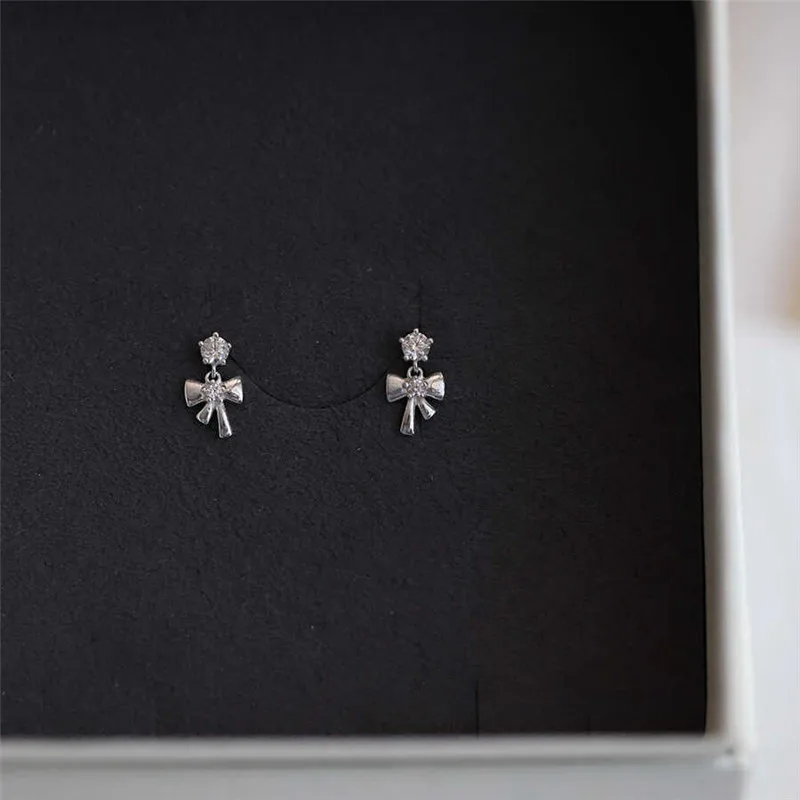 S925 Sterling Silver 14KGold-plated Compact Bow Cute Korean Stud Earrings Women Student Daily Jewelry
S925 Sterling Silver 14KGold-plated Compact Bow Cute Korean Stud Earrings Women Student Daily Jewelry