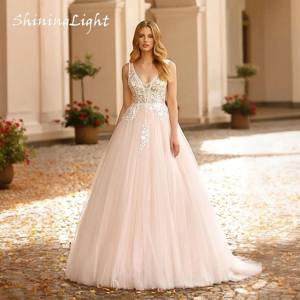 ShiningLight Blush Pink Ball Gown Wedding Dress V-Neck Lace Appliques 2026 Vedtidos Civil Boho Princess Bridal Dress Customized
ShiningLight Blush Pink Ball Gown Wedding Dress V-Neck Lace Appliques 2026 Vedtidos Civil Boho Princess Bridal Dress Customized