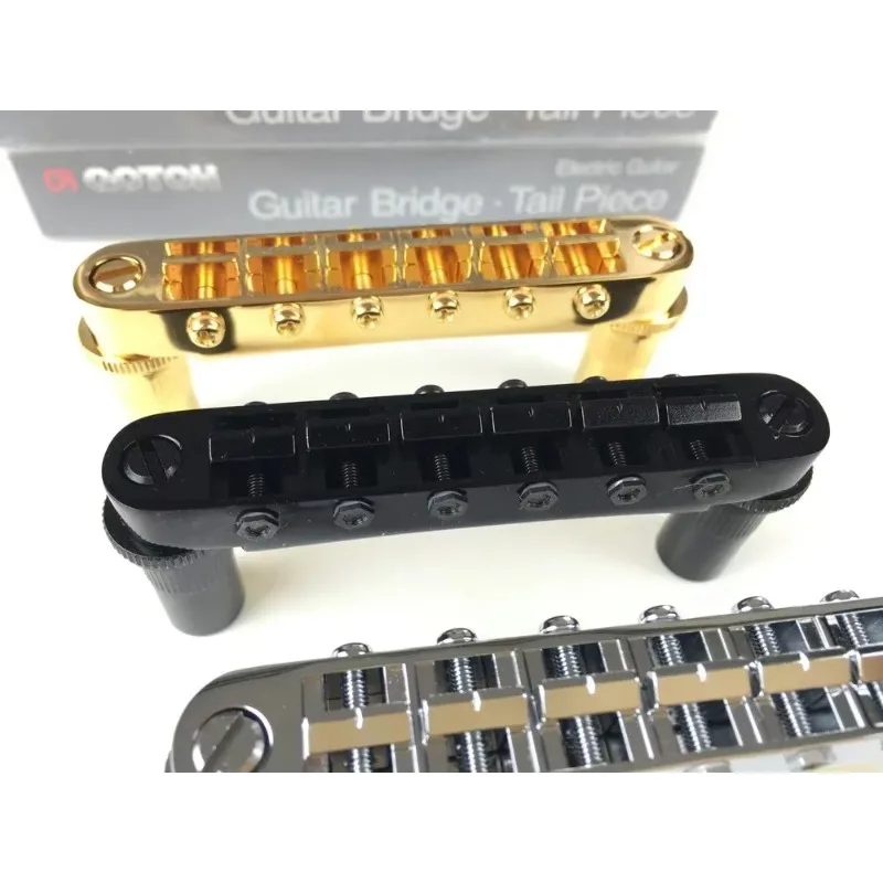 Магазин Bo-Hong Store-горячая распродажа-оригинальный GOTOH GE103B-T седло Tune-O-Matic Style электрогитарный мост для Epip Standard SG
Магазин Bo-Hong Store-горячая распродажа-оригинальный GOTOH GE103B-T седло Tune-O-Matic Style электрогитарный мост для Epip Standard SG