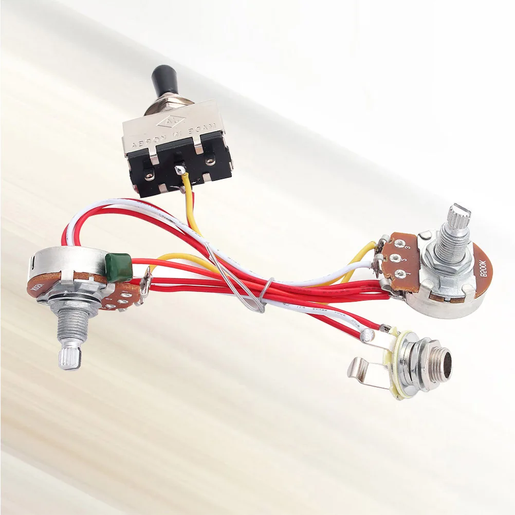 Potentiometer Black Button 3 Way Toggle Volume Tone Wiring Harness Guitar Electric Kit 
Potentiometer Black Button 3 Way Toggle Volume Tone Wiring Harness Guitar Electric Kit