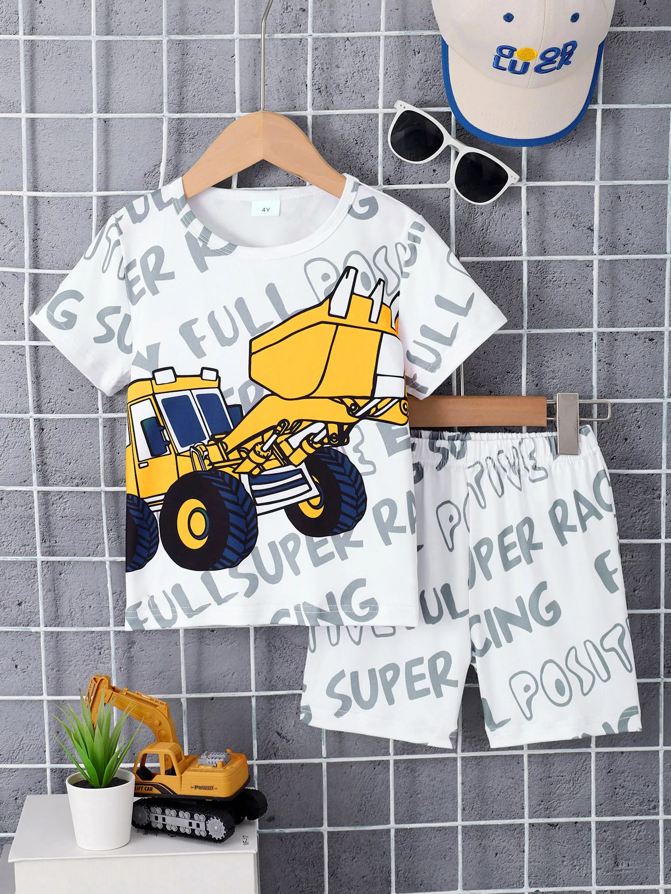 2PCS Fashion Summer Boys' Clothing Excavator Printed Short sleeved T-shirt+Letter Printed Shorts for 4-7Y Children's Leisure Set
2PCS Fashion Summer Boys' Clothing Excavator Printed Short sleeved T-shirt+Letter Printed Shorts for 4-7Y Children's Leisure Set