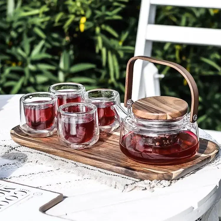 6 Sets / Set Kung Fu Tea Set Transparent Glass Teapot Sets Anti-hot Double Cup Japanese Cold Kettle Wooden pallets Tray set Gift
6 Sets / Set Kung Fu Tea Set Transparent Glass Teapot Sets Anti-hot Double Cup Japanese Cold Kettle Wooden pallets Tray set Gift