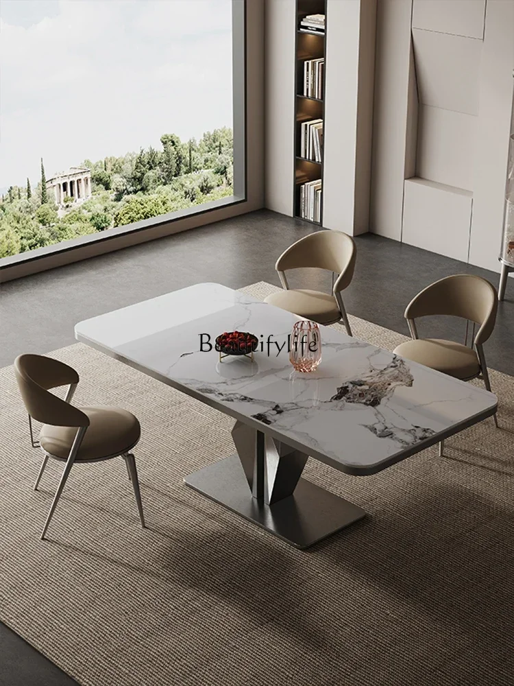 lRock slab dining table light luxury modern simple small apartment high-end Italian minimalist luxury stone rectangular table 
lRock slab dining table light luxury modern simple small apartment high-end Italian minimalist luxury stone rectangular table