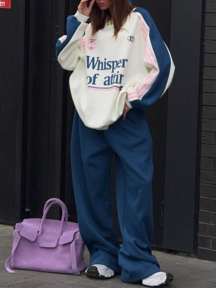 Высококачественная осенне-зимняя толстовка с цветными брюками, комплект из двух предметов, Новое поступление 2025, женский костюм в европейском и американском стиле
Высококачественная осенне-зимняя толстовка с цветными брюками, комплект из двух предметов, Новое поступление 2025, женский костюм в европейском и американском стиле