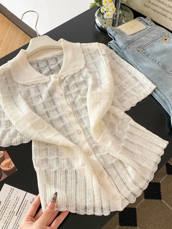 Sweet Style Doll Collar Hollow out Knitted Short Sleeve Thin Ice Silk Cardigan Women's Design Summer Korean Light Weight Top
Sweet Style Doll Collar Hollow out Knitted Short Sleeve Thin Ice Silk Cardigan Women's Design Summer Korean Light Weight Top