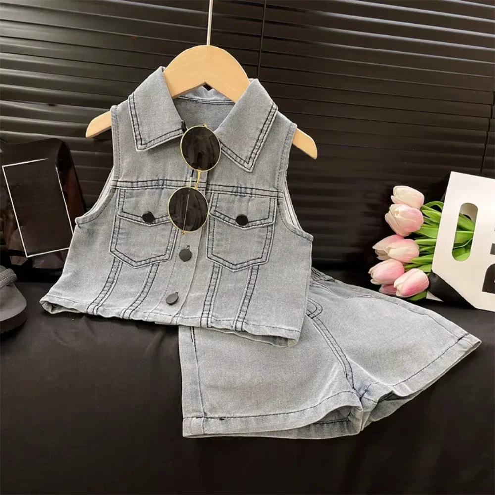 Summer New Denim Kids Set Korean Version Solid Color Sweet Girls Clothes Sleeveless Single Breasted Top+Shorts Two-piece Sets
Summer New Denim Kids Set Korean Version Solid Color Sweet Girls Clothes Sleeveless Single Breasted Top+Shorts Two-piece Sets