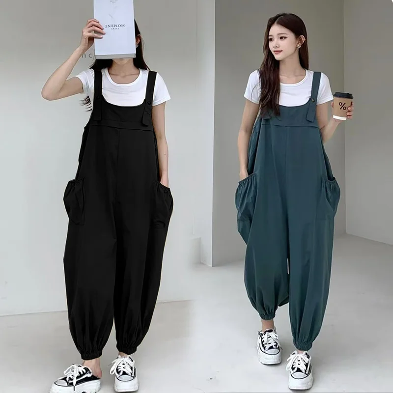 Женские летние повседневные широкие комбинезоны больших размеров, свободная рабочая одежда, свободные висячие брюки, скрывающие мясо, модный комбинезон
Женские летние повседневные широкие комбинезоны больших размеров, свободная рабочая одежда, свободные висячие брюки, скрывающие мясо, модный комбинезон