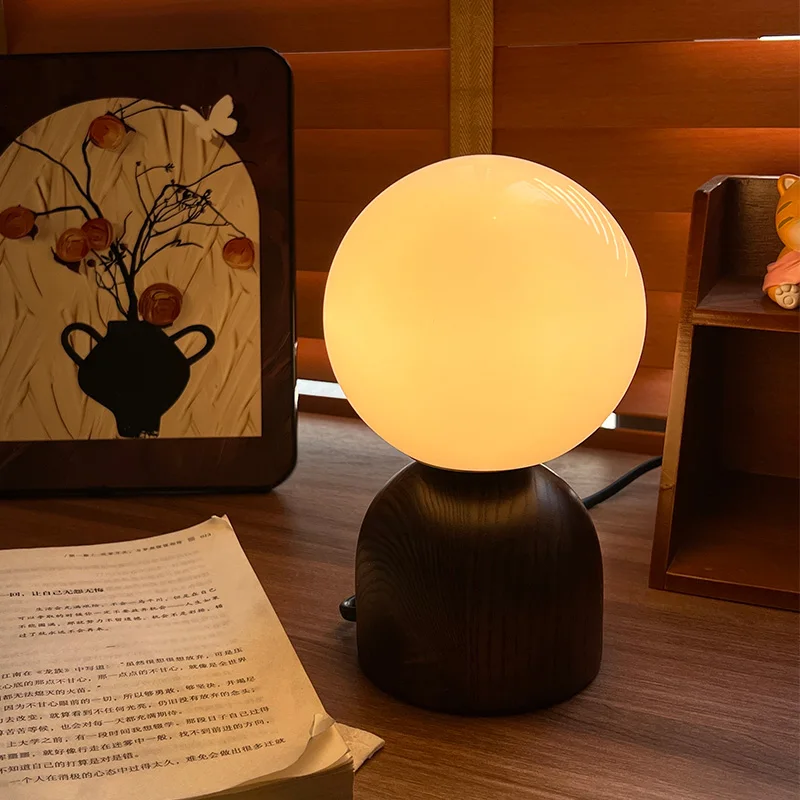 Retro literary black walnut table lamp horizontal bedside lamp round ball lampshade living room desk wabi sandy wind log
Retro literary black walnut table lamp horizontal bedside lamp round ball lampshade living room desk wabi sandy wind log
